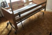 letto in legno per anziani con movimento elettrico